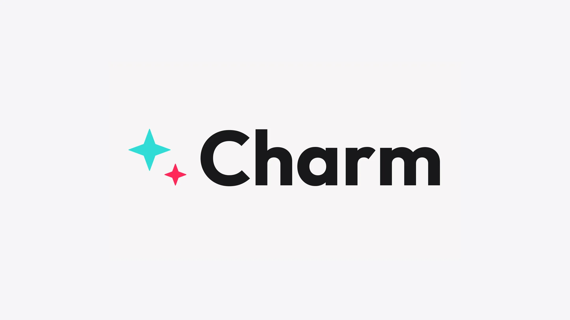 Charm logo lockup with teal and pink spark marks